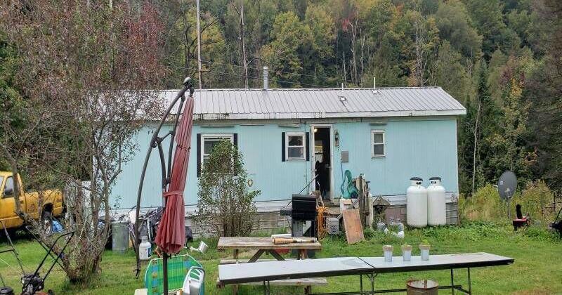 Neighbors Ask Sutton Officials To Address Tire-Strewn Property