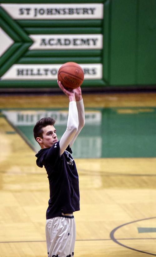 H.S. hoops: St. J escapes feisty Colonels