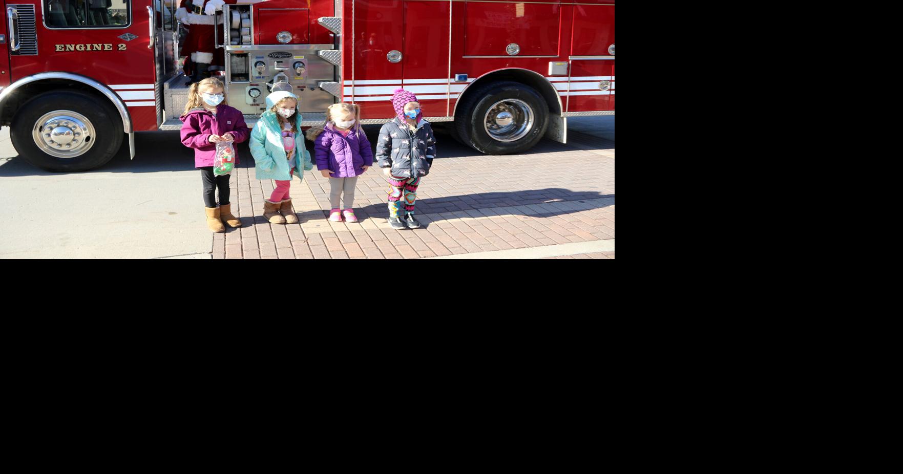 Lights, sirens, it's Santa and Mrs. Claus Multimedia