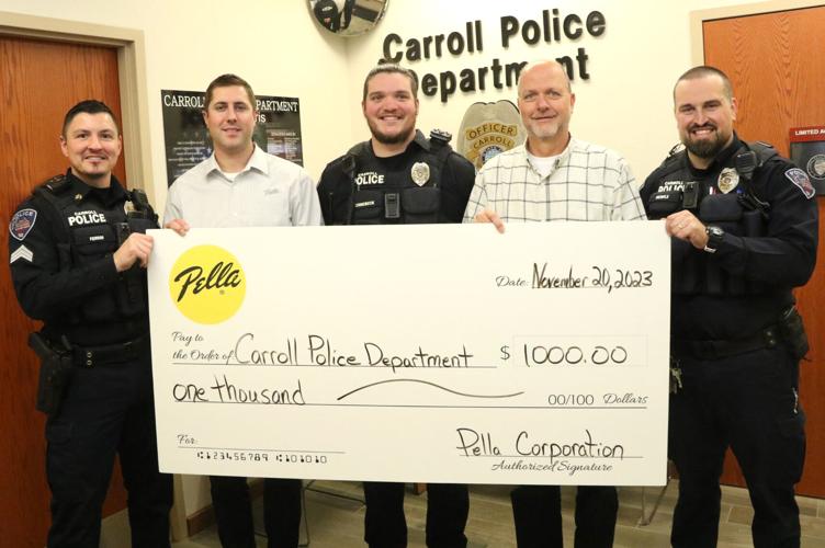 Pella Corp. donates to Carroll Police, Fire Departments News