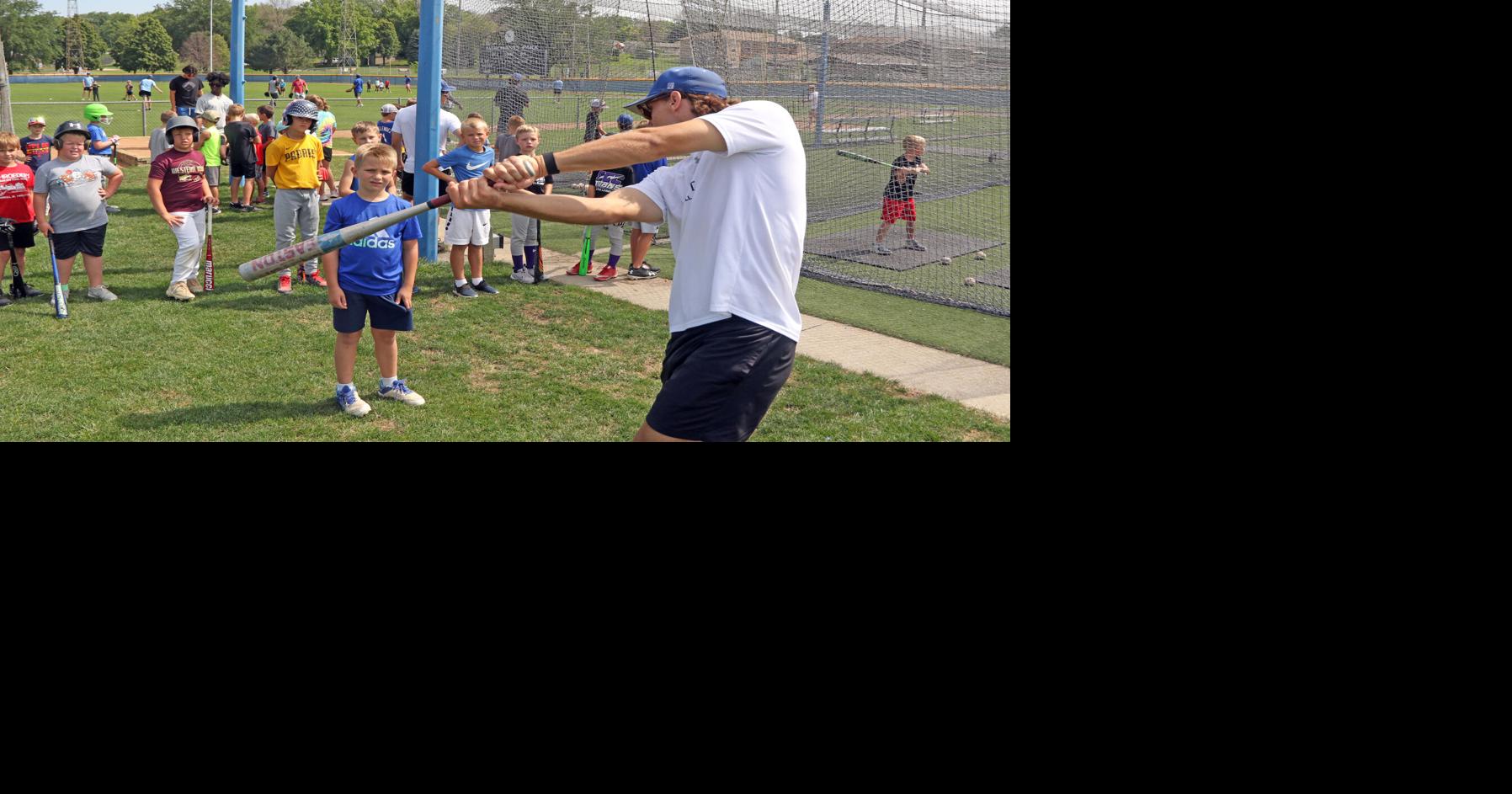Play ball! Merchants coach kids’ clinics | News | carrollspaper.com