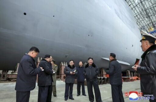 North Korea's Kim inspects 'nuclear-powered submarine' project ...