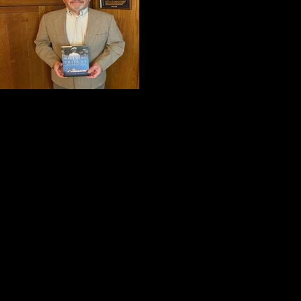 Chardon councilman pens first book, on naval history