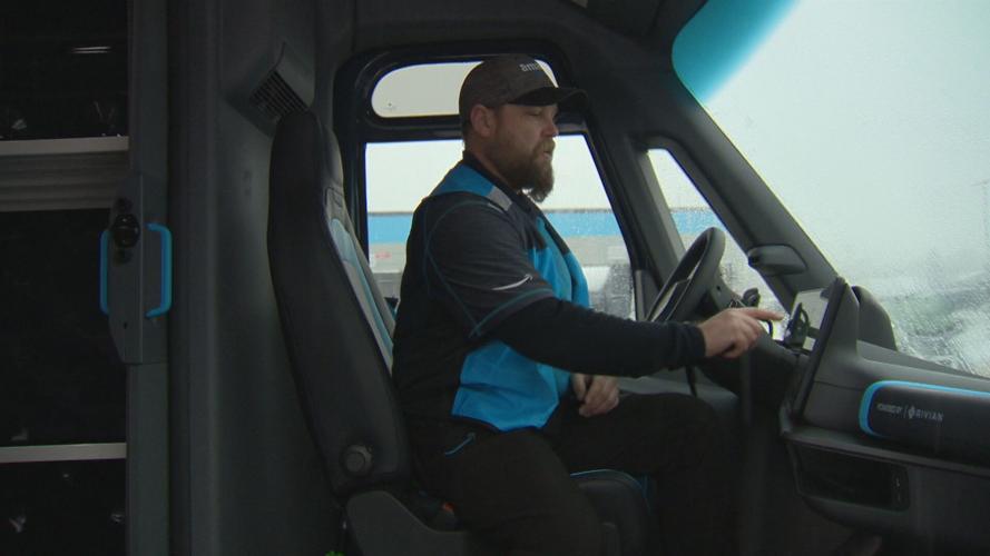 Amazon electric delivery vehicle interior driver