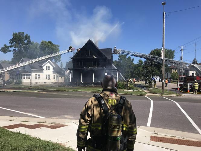 Multiple crews respond to large house fire in Portage, people asked to