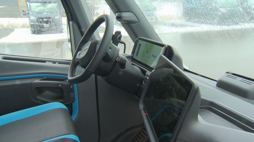 Behind the wheel of the Amazon electric delivery vehicle.jpeg