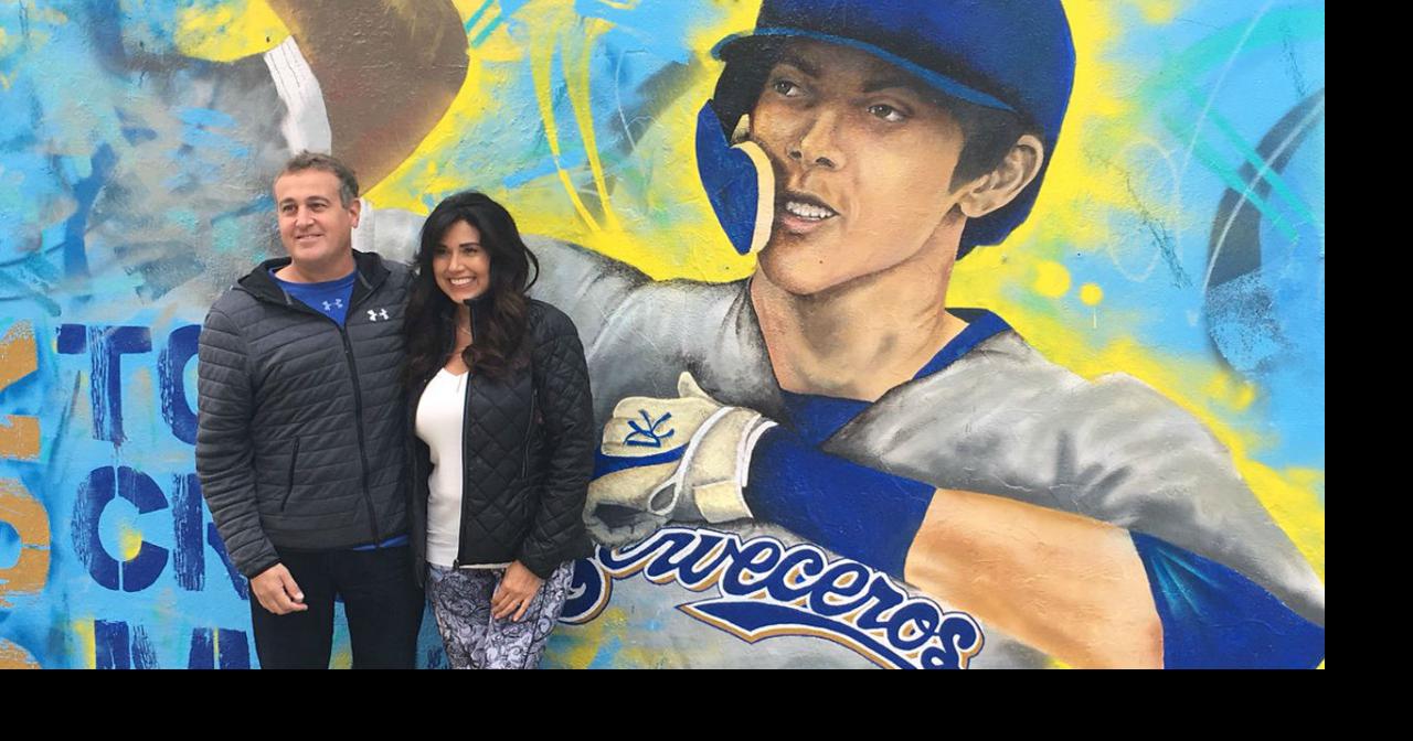 Yelich's parents visit mural of their son before game