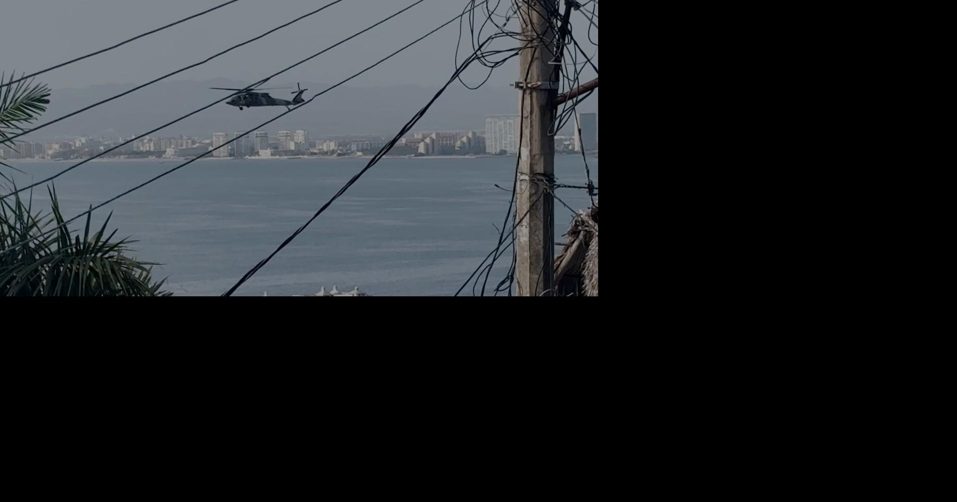 Mexican military helicopters fly over Puerto Vallarta