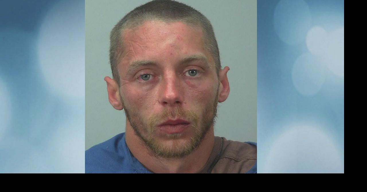 Man wakes up to acquaintance trying to strangle him, holding knife
