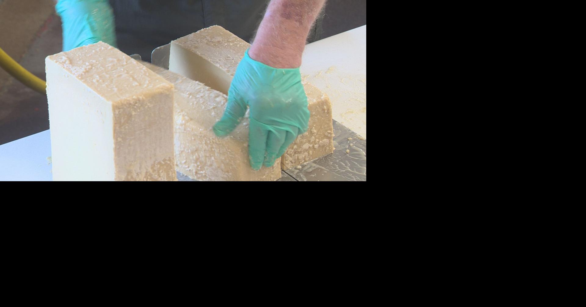 Cut the cheese Hook's Cheese Company slices blocks of 20year aged