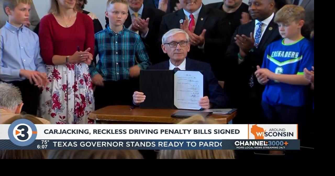 Evers signs carjacking, reckless driving penalty bills | Video ...