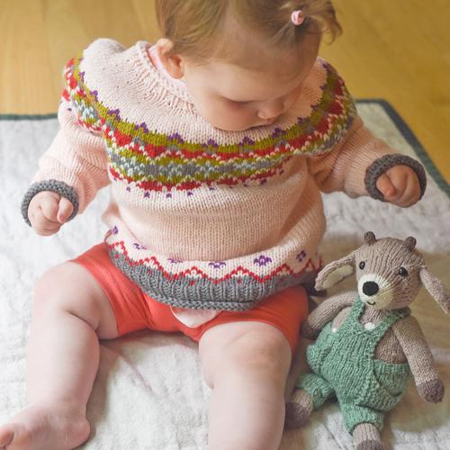 Susan B. Anderson grandchild with toy