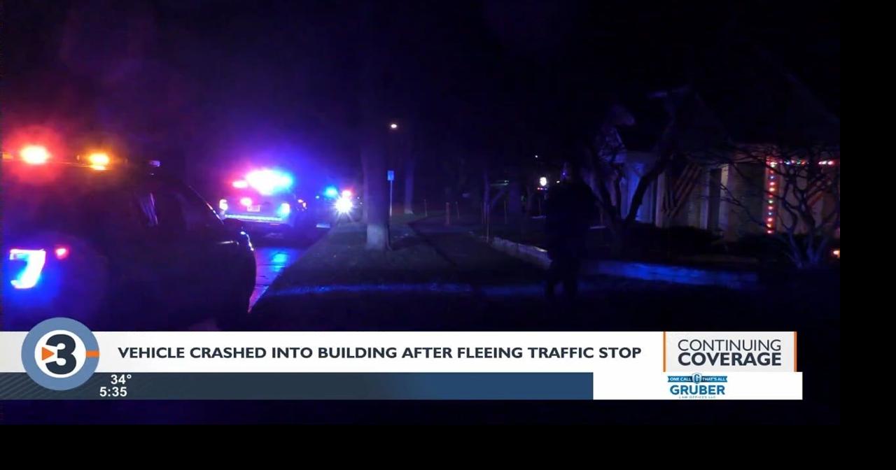Vehicle crashes into residential building after fleeing traffic stop ...