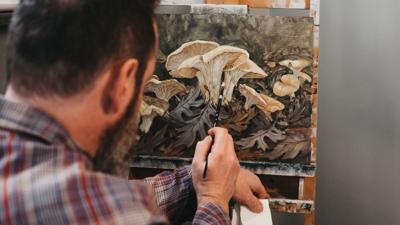 Jesse Mangerson painting mushrooms
