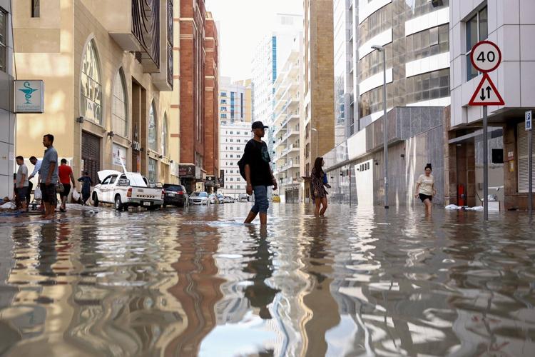 Dubai airport struggles to resume flights after heavy rains leave runways underwater