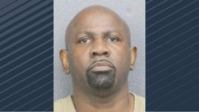 Principal arrested for allegedly impersonating deputy, documents say