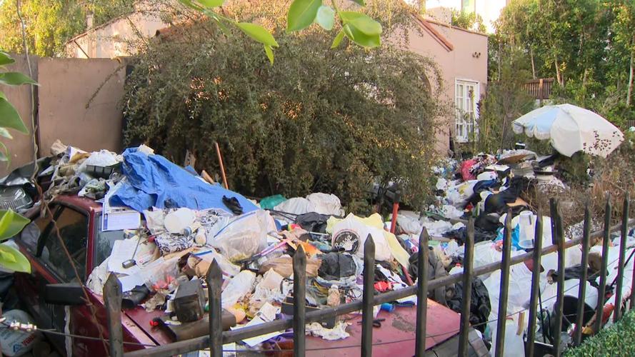 Piles of trash return to Fairfax home, court considers conservator for ...