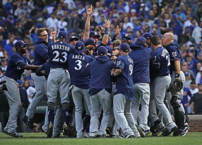 NL roundup: Cain helps Brewers top Cubs for Central title