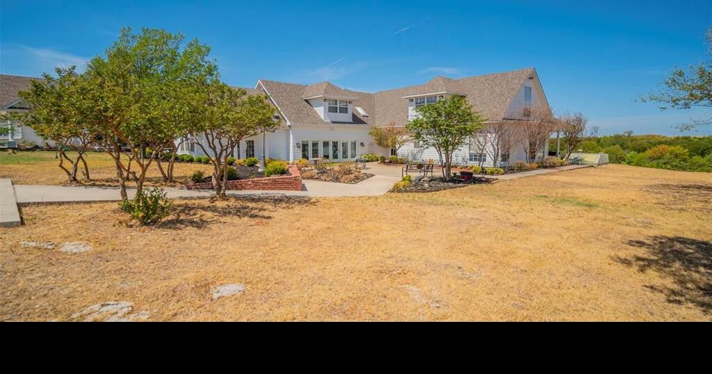 This property in Decatur has a 4bedroom home, a carriage house and a stocked pond with a