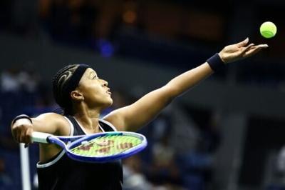 Japan's Naomi Osaka serves in her US Open first-round victory over Anastasia Zakharova