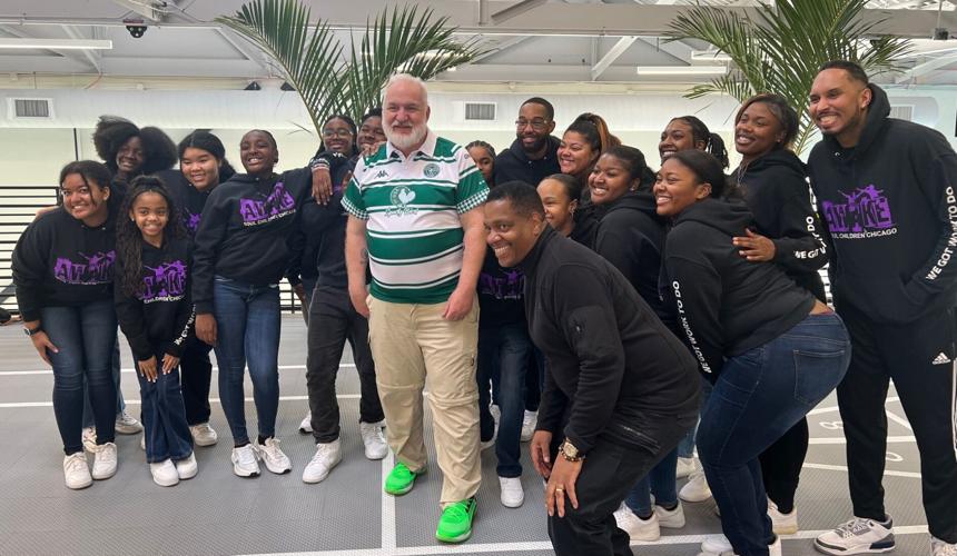 Chef Art Smith poses with the Soul Children of Chicago at his birthday party at SPF Chicago. (Photo by Candace Jordan)