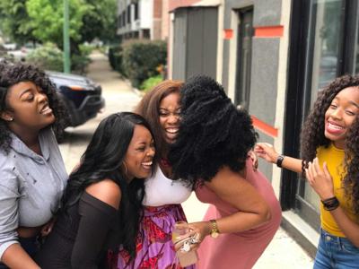 Women laughing on the street