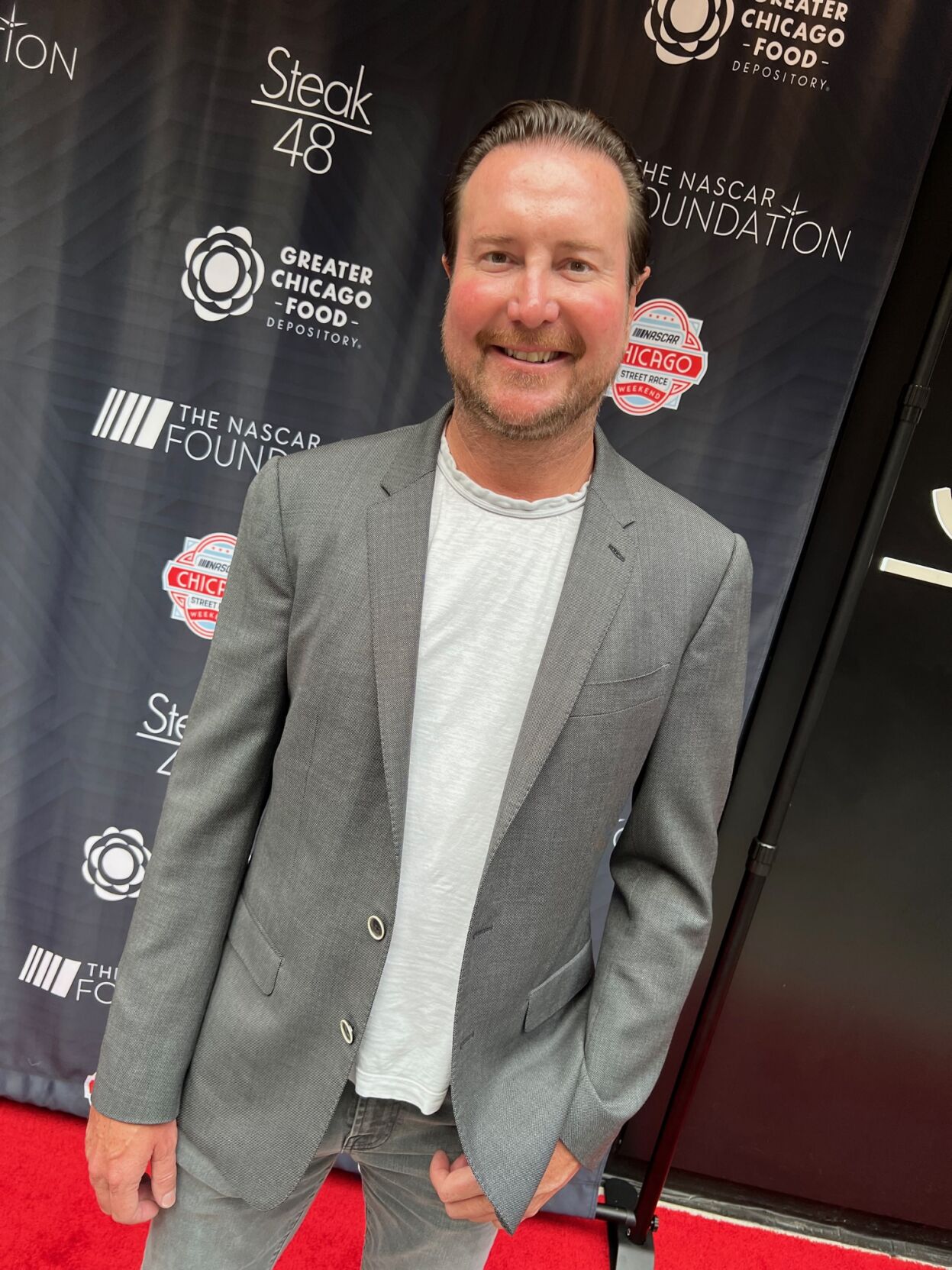 NASCAR driver Kyle Busch attends fundraiser at Steak 48. He has the most wins cross NASCAR's top three series in history (228). (Photo by Candid Candace Jordan)