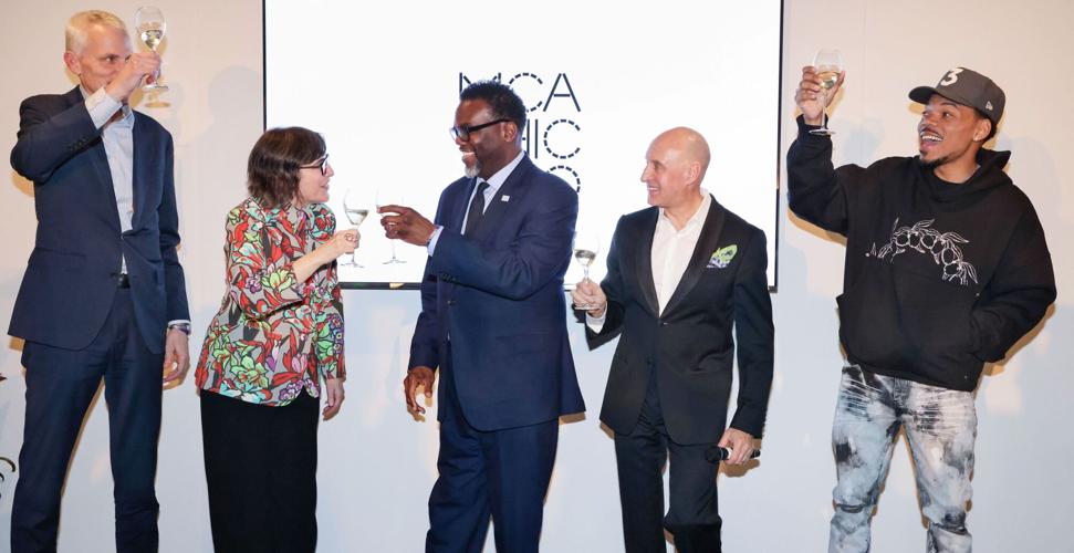 Michael O'Grady (Northern Trust Corp. Chairman and Chief Executive Officer); Madeleine Grynsztejn (MCA Chicago’s Pritzker Director); Brandon Johnson (Mayor-Elect); Tony Karman (EXPO CHICAGO president/director) and Chance the Rapper, toast to this year'...