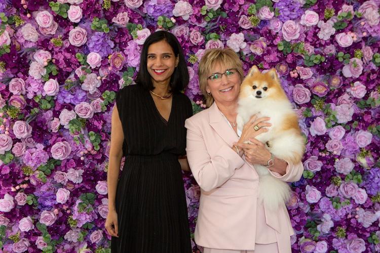 DV survivors Christy Martin holding Champ and Yashi. They shared their personal stories to inspire and motivate other DV survivors to thrive.