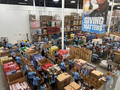 aldi packs 6000 boxes for disaster relief