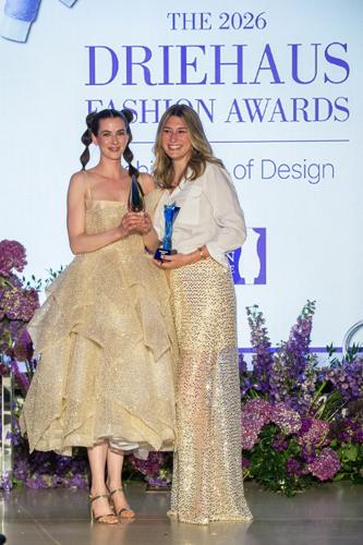 Model Sharon Talcott with designer Emma Mendell, first place winner and first ever Best Construction Award winner, Dominican University. (Phil Farber photo)