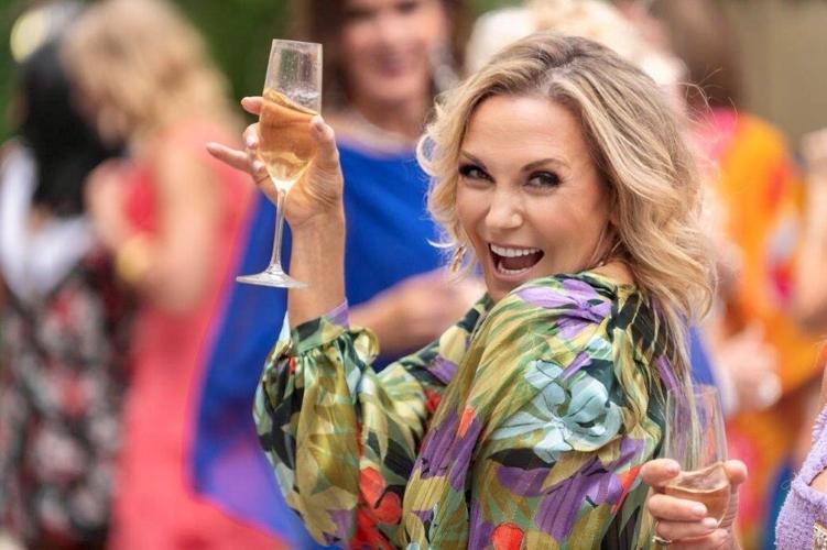 SC member Tina Weller toasts to the organization at the after-party on Shanghai Terrace at the Peninsula.