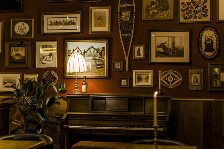 Motel Bar has warm supper club decor.