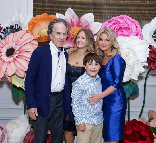 Honoree Dr. Stacie McClane surrounded by her loving family. (Mila Samokhina photo)