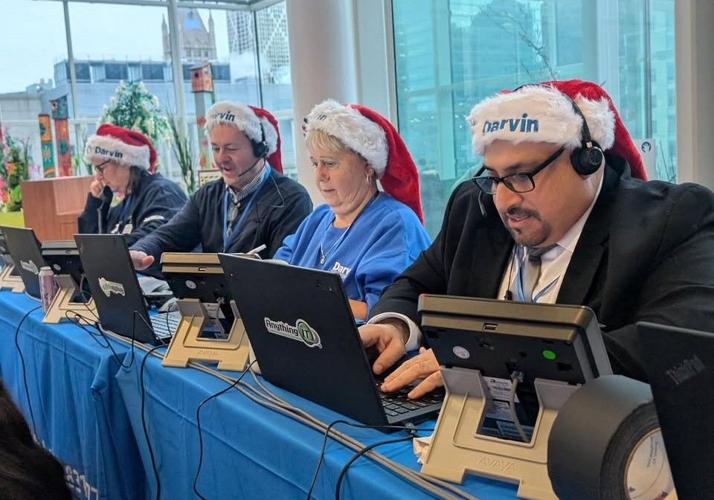 Darvin team members manning the phones at Lurie's Radiothon.