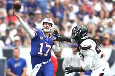 Buffalo's Josh Allen throws the ball in what became his first NFL triumph at Houston after four defeats