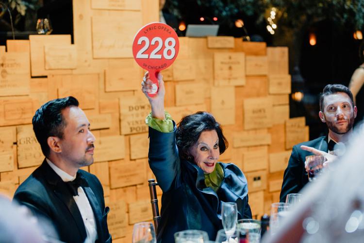 2023 wine auction paddle raising
