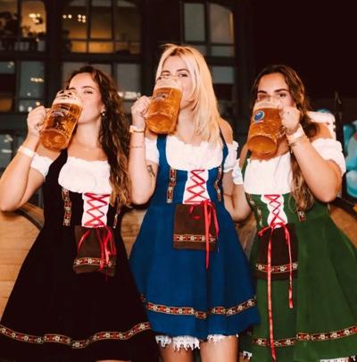 Oktoberfest Nation returns to Fulton Market Sept. 17-Oct. 26 with Hofbräu München beer, German food, live music, carnival games and the Devil’s Wheel. (Oktoberfest Nation photo)