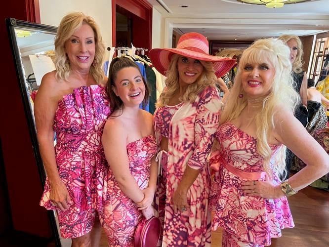 Designer Lauren Lein (R) with her models Sheree Schimmer, her daughter Andreah Violet Santos,  and Tina Gravel.
