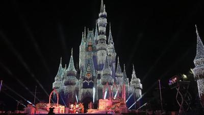 Cinderella Castle illuminated with holiday lights