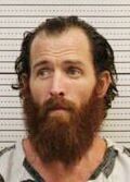 Man faces firearms, fleeing charges