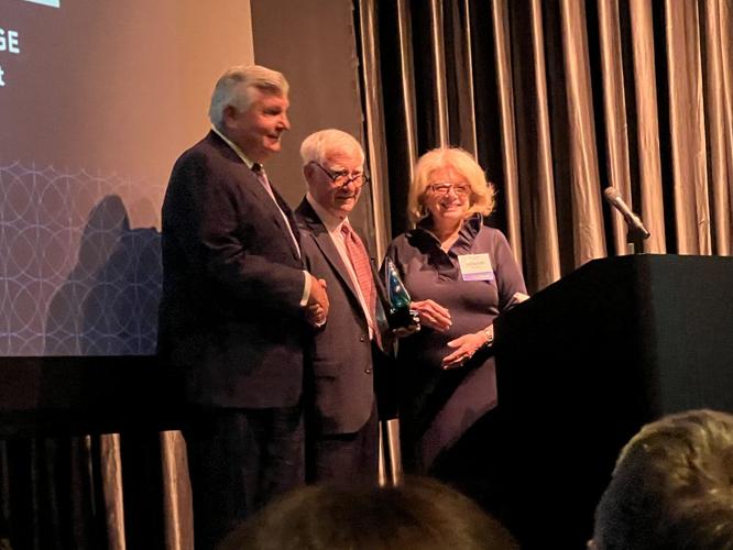 Lucien Lagrange receives Vision into Reality Award from Michael Reschke, Sr. and Deborah Gershbein (SOAR president). (Photo by Candid Candace Jordan)