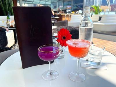 Io Godfrey new happy hour menu main pic of two drinks