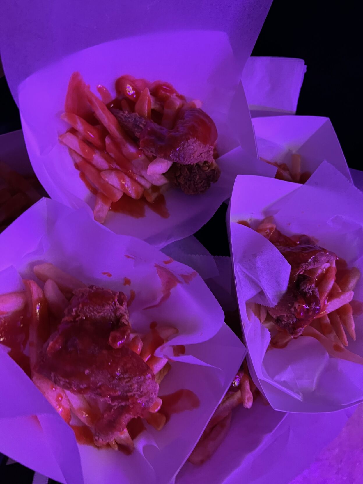 Harold's Chicken was served at event with hot sauce and fries.