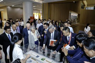 Participants at a themed exhibition commemorating the 80th anniversary of the victory in the Chinese People's War of Resistance Against Japanese Aggression and the World Anti-Fascist War in Shanghai on June 23 (COURTESY PHOTO)
