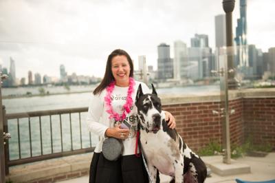 Magdalena Huk with Chicago the Great Dane at PAWS Chicago's 19th annual Beach Party at Offshore Navy Pier. (Photo by Sparenga Photography)