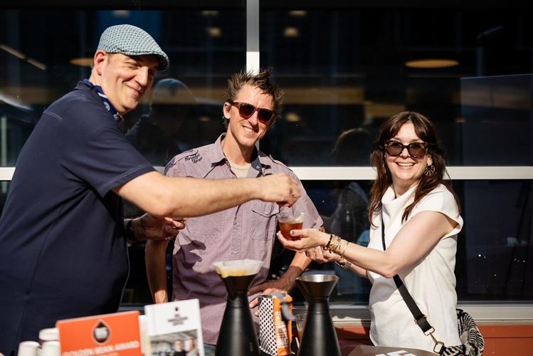 Amanda Puck with Big Shoulders Coffee's Dave Marsalek and Chef Jaymes Berry.
