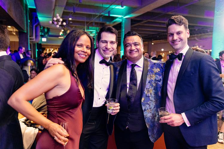 Associates Board Members Adrienne Pope, Peter Hegel and Andrew Holden with Ben Hester. (Photo by Kyle Flubacker)