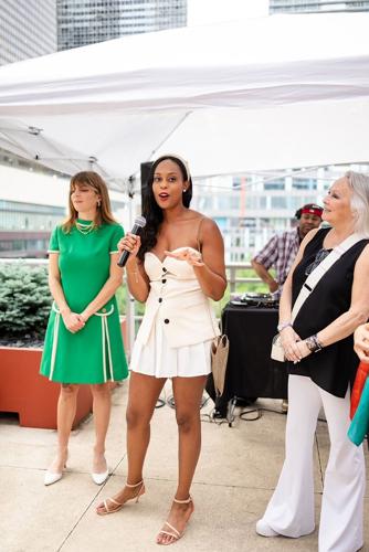 Ashlea Hearn, Chicago Star Marketing Manager, speaks at party.