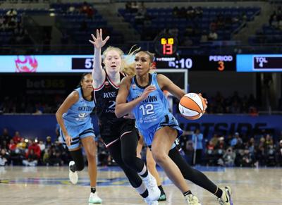 Sydney Taylor drives for a basket. (Photo | sky.wnba.com)